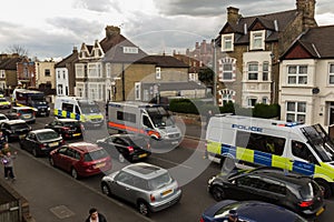 Many police vehicles